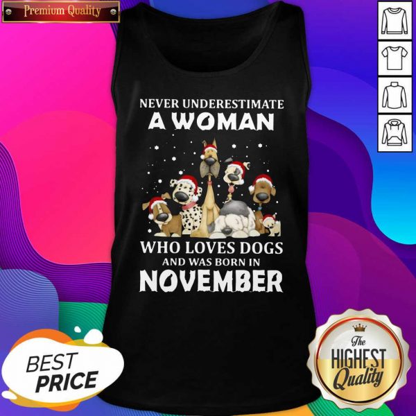 Never Underestimate A Woman Who Loves Dogs And Was Born In August Christmas Tank Top- Design By Sheenytee.com